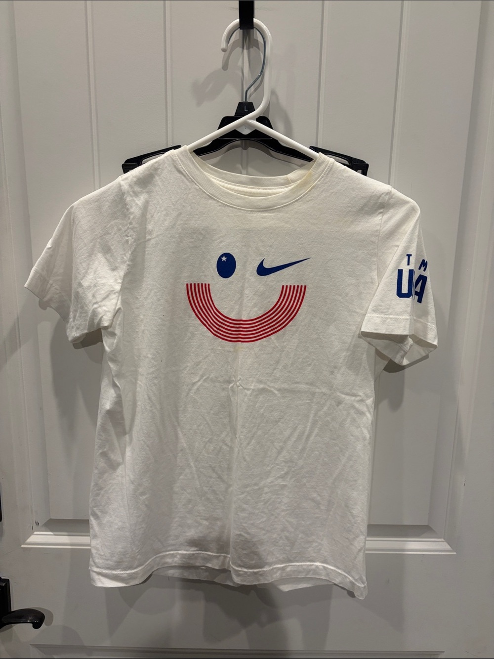 Nike White Short-Sleeve Tee with Red Smile & Blue Swoosh